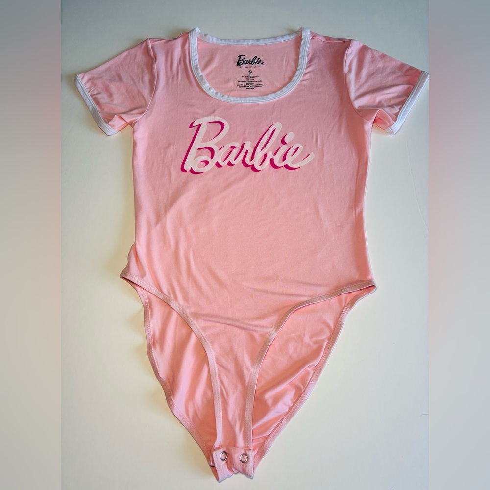 BARBIE short sleeve bodysuit top pink and white size Small. Snap closure